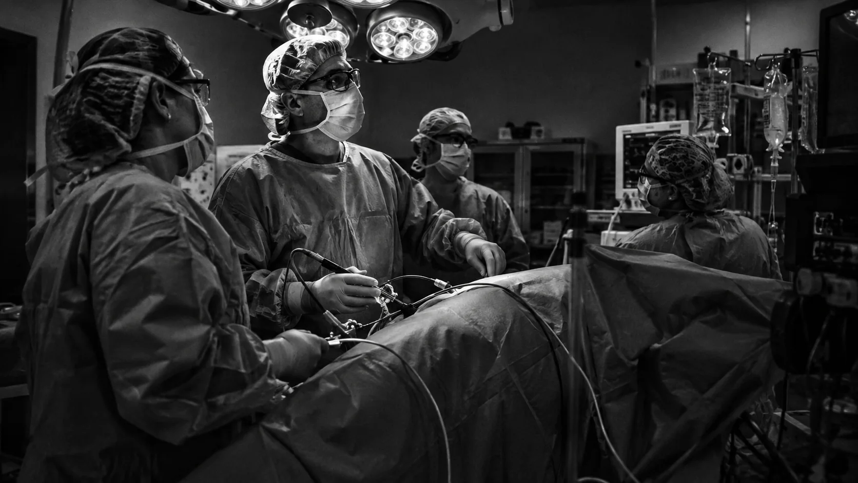 Bariatric surgical team performing a laparoscopic procedure in an operating room